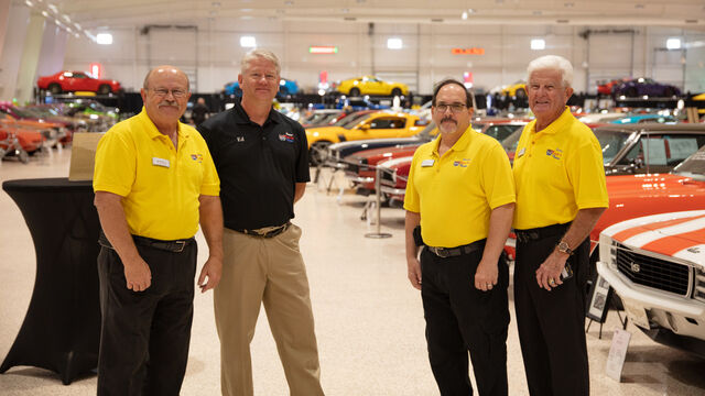 Staff members pose for a photo at the Candlelighters of Brevard Cars and Casino Night