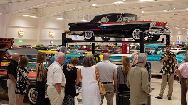 Candlelighters of Brevard Cars and Casino Night attendees viewing some of the exotic cars