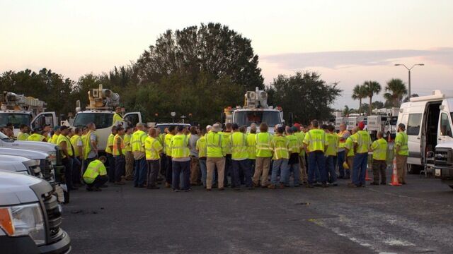 Crews gathering for daily instructions. Photo By: Andrew Mackey