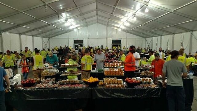 Crews up before sunrise, quick trip to food tent, then off to work