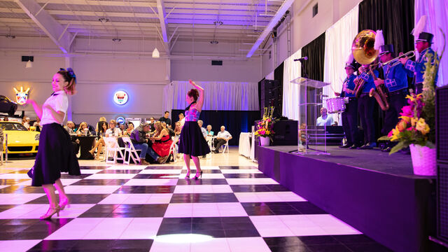 A band plays while some staff members dance at the Health First 35th Celebration of Giving Event