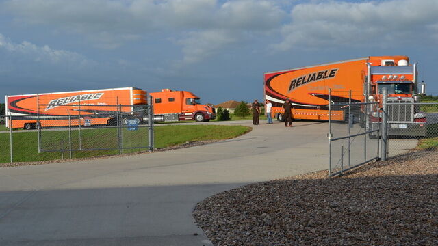 Trucks arrive with more cars for the American Muscle Car Museum