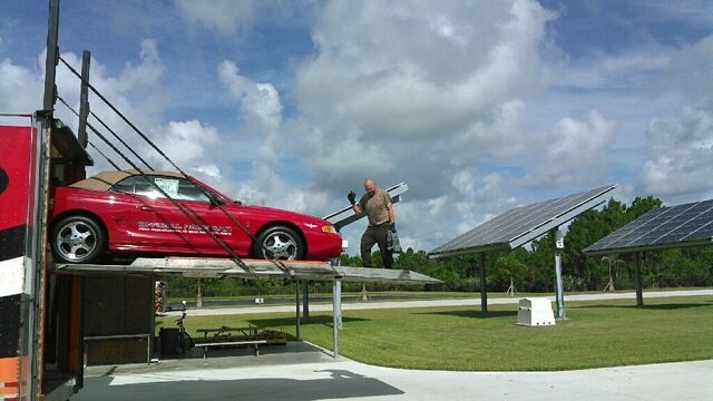 Unloading a car at the new American Muscle Car Museum