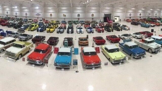 An array of many different types of vehicles at the American Muscle Car Museum