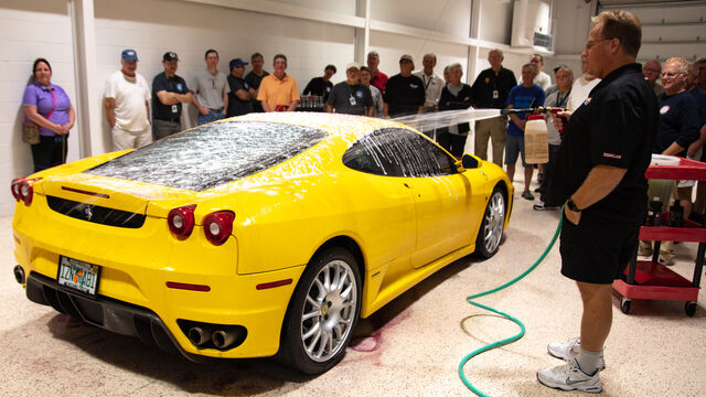 Rinsing the car down after a good washing