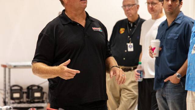 Explaining the steps involved at the Porsche Club of America Detail Class