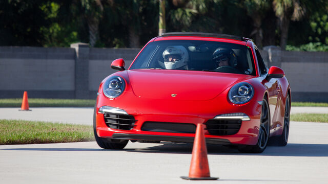 Red Porsche driving