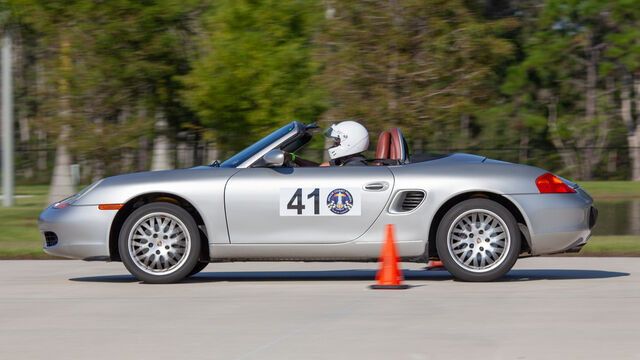 Grey Porsche driving