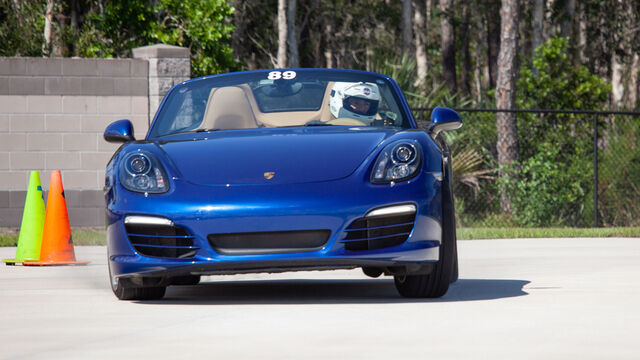 Blue Porsche number 89 driving at the Porsche Club of America (PCA) Autocross 