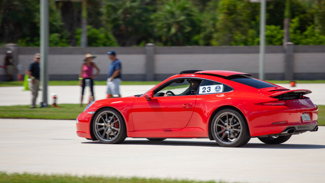 Red 23 driving the track