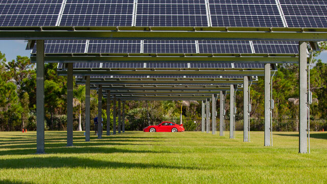 Red Porsche and solar array