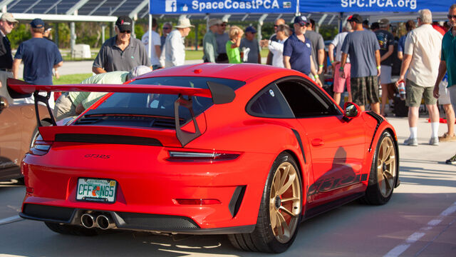 A red GT3RS prepares for the Porsche Club of America (PCA) Autocross 