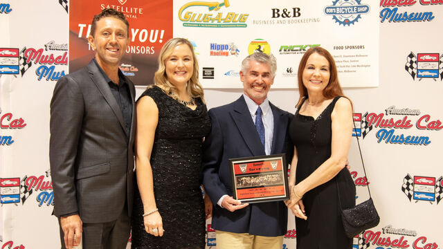 Smith Surveying receiving their thank you plaque