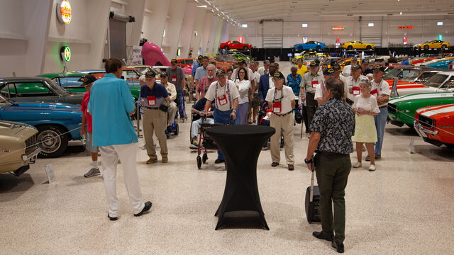 Some of the veterans tour the vintage cars at the Space Coast Honor Flight Event