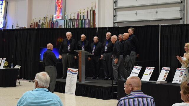 Listening to some singing at the Space Coast Honor Flight Event