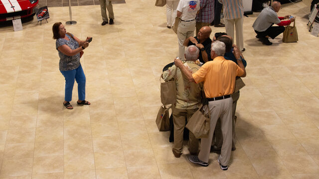 Taking a photo at the Space Coast Honor Flight Event