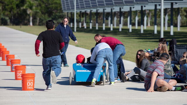 Final pit preparations are performed before the race