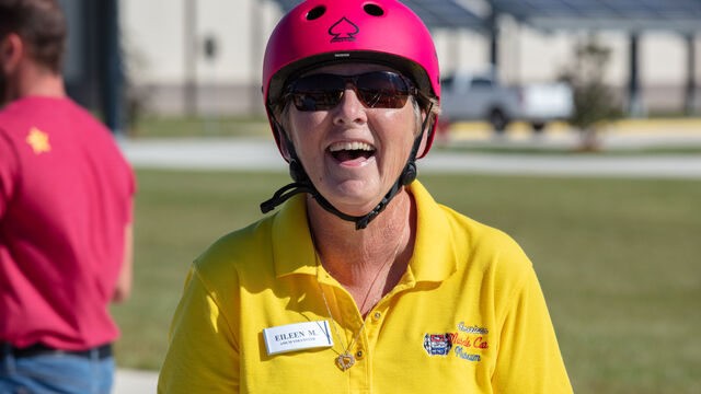 Eileen takes a photo at the Sunshine State Superkids soapbox derby 