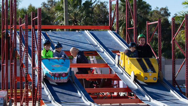Coming down the ramps, these kids are racing for the win at the Sunshine State Superkids soapbox derby